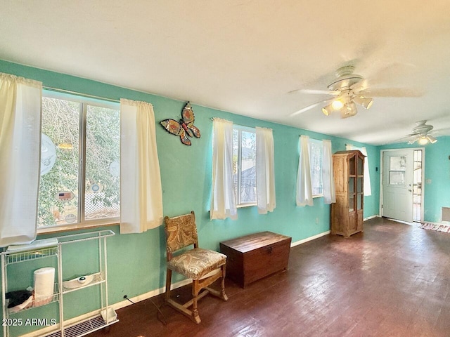 9495 E Marilyn Ln, Dewey, AZ 86327 - living area featuring ceiling fan, wood finished floors, and baseboards