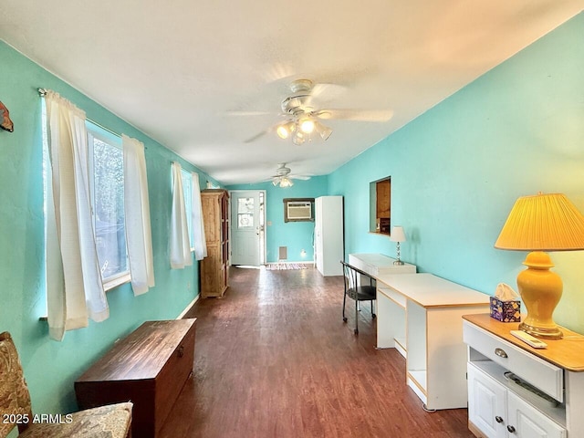 9495 E Marilyn Ln, Dewey, AZ 86327 - office with ceiling fan, a wall mounted AC, dark wood-style floors, and baseboards
