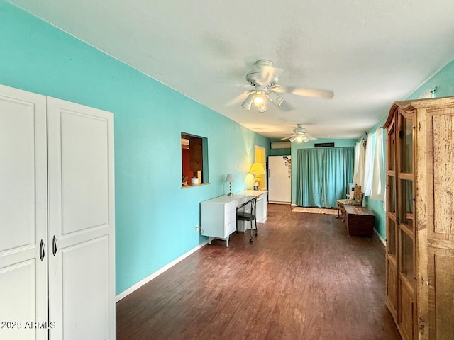 9495 E Marilyn Ln, Dewey, AZ 86327 - sitting room with a ceiling fan, dark wood-style flooring, and baseboards