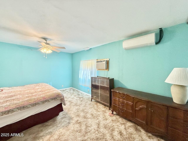 9495 E Marilyn Ln, Dewey, AZ 86327 - bedroom with a wall mounted air conditioner, an AC wall unit, light colored carpet, and a ceiling fan