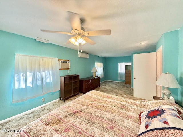 9495 E Marilyn Ln, Dewey, AZ 86327 - bedroom featuring a wall mounted air conditioner, carpet floors, a wall mounted AC, and a ceiling fan