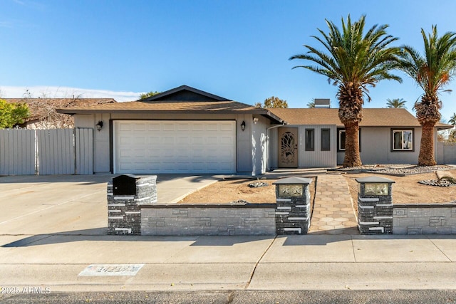 single story home featuring a garage