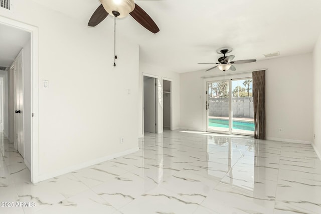 unfurnished room featuring ceiling fan