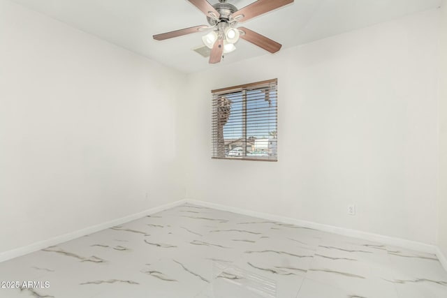 spare room featuring ceiling fan