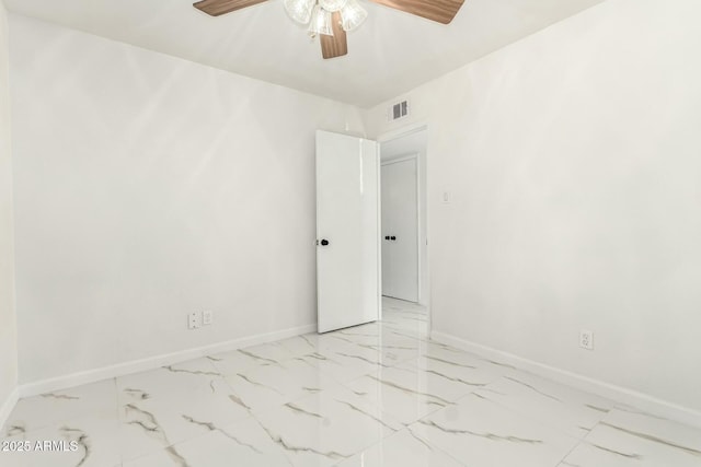 spare room featuring ceiling fan