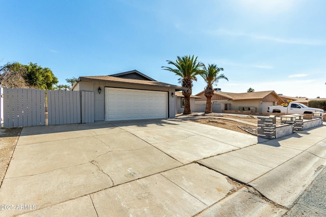 ranch-style house featuring a garage