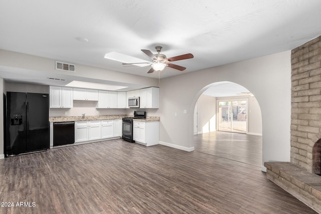 kitchen featuring ceiling fan, sink, dark wood-type flooring, white cabinets, and black appliances