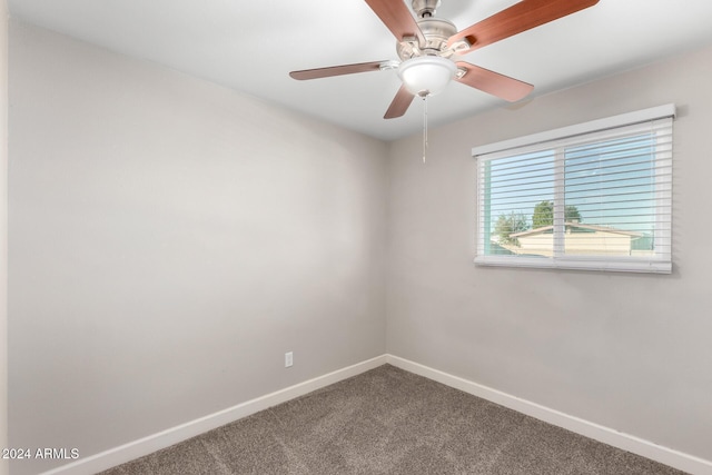 carpeted empty room with ceiling fan