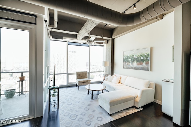 1 E Lexington Ave Unit 1306, Phoenix, AZ 85012 - living room with wood finished floors, ceiling fan, a wall of windows, and rail lighting