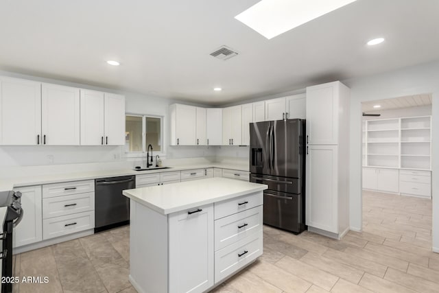 kitchen featuring white cabinetry, sink, black dishwasher, and fridge with ice dispenser