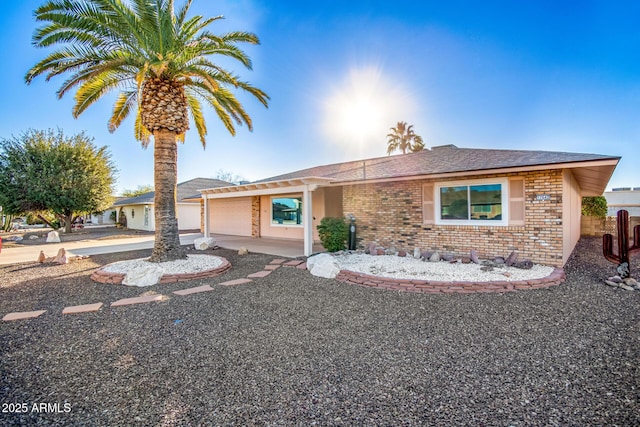 single story home with a garage