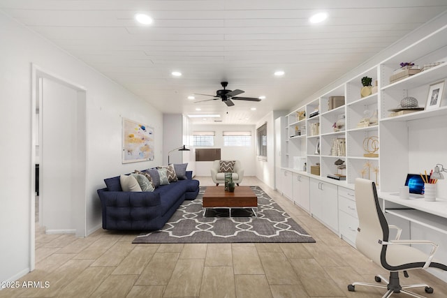 office with wood ceiling, ceiling fan, and built in desk