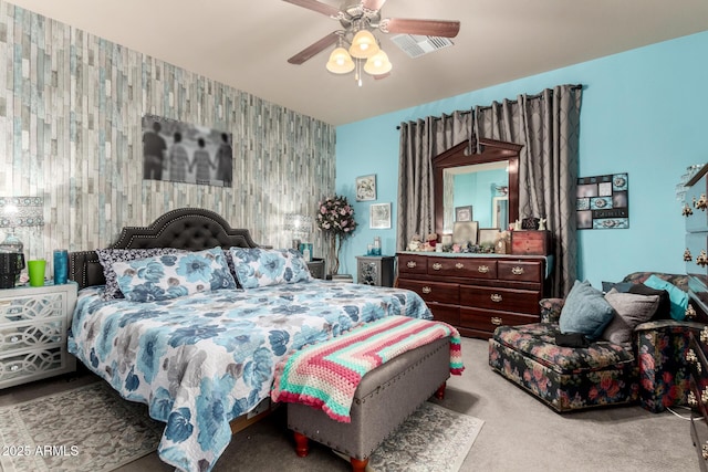 7015 W Melody Dr, Laveen, AZ 85339 - carpeted bedroom with an accent wall, wallpapered walls, and ceiling fan