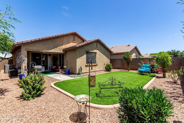 7015 W Melody Dr, Laveen, AZ 85339 - rear view of house featuring stucco siding, a tile roof, and a patio