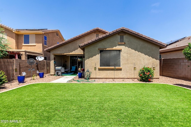 7015 W Melody Dr, Laveen, AZ 85339 - rear view of property with stucco siding, a patio, and a tiled roof