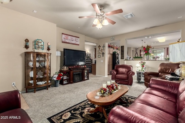 7015 W Melody Dr, Laveen, AZ 85339 - living area featuring carpet floors and a ceiling fan