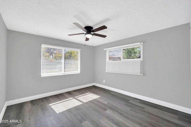 7039 N 15th St, Phoenix, AZ 85020 - spare room with a textured ceiling, wood finished floors, ceiling fan, and baseboards