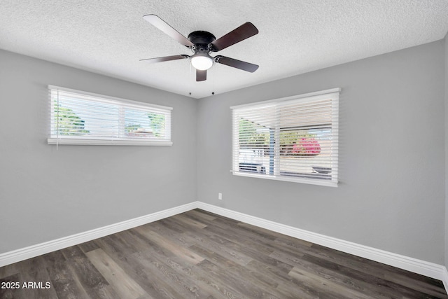 7039 N 15th St, Phoenix, AZ 85020 - unfurnished room featuring a textured ceiling, baseboards, a ceiling fan, and dark wood finished floors