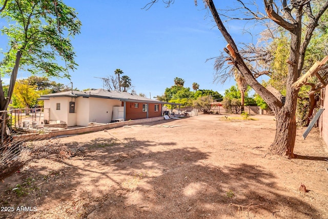 7039 N 15th St, Phoenix, AZ 85020 - view of yard featuring a fenced backyard and a patio area