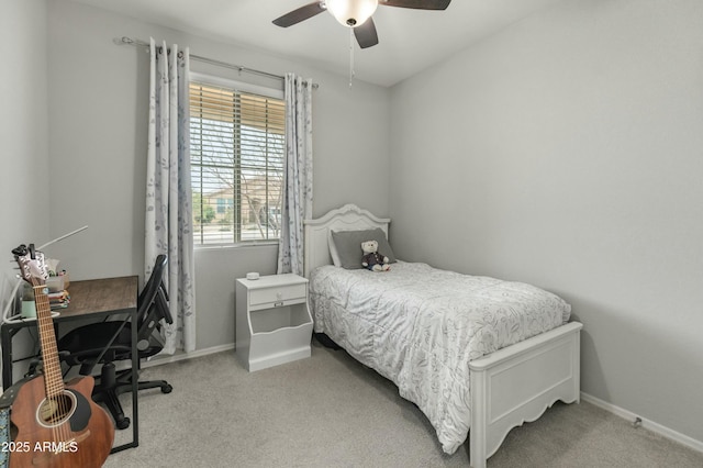 bedroom with carpet floors, baseboards, and a ceiling fan