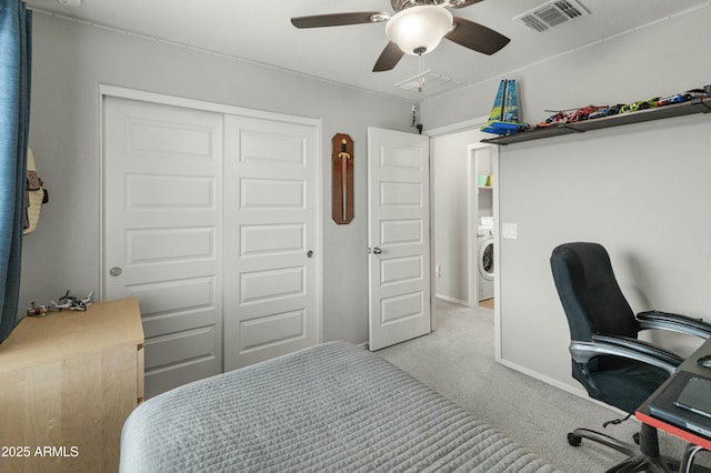 bedroom featuring washer / dryer, visible vents, ceiling fan, carpet flooring, and a closet