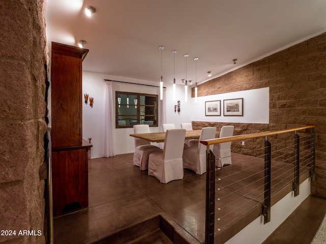 dining area with lofted ceiling