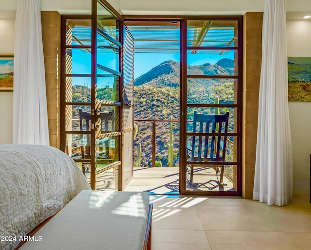 bedroom featuring multiple windows