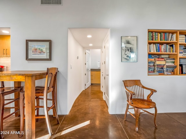 corridor featuring concrete floors