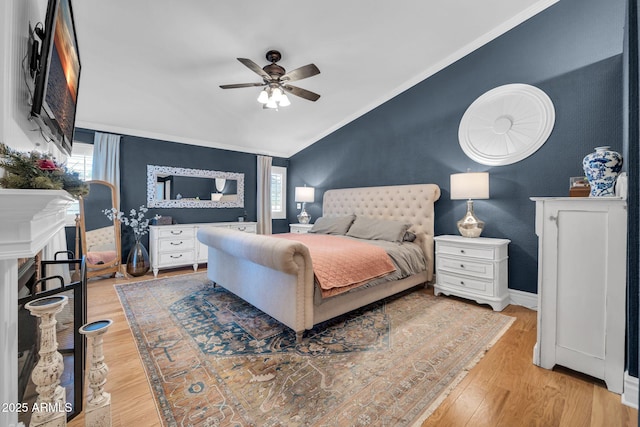 6708 W Utopia Rd, Glendale, AZ 85308 - bedroom featuring lofted ceiling, multiple windows, light wood-style floors, crown molding, and ceiling fan
