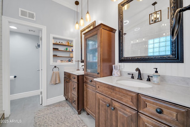 6708 W Utopia Rd, Glendale, AZ 85308 - bathroom featuring vanity, crown molding, tile patterned flooring, and a chandelier