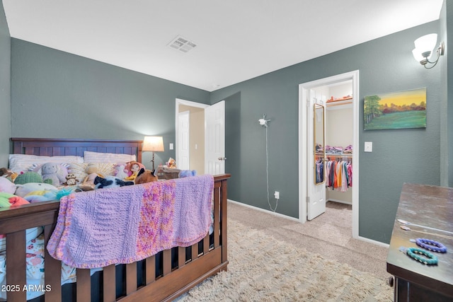6708 W Utopia Rd, Glendale, AZ 85308 - carpeted bedroom featuring a walk in closet and a closet