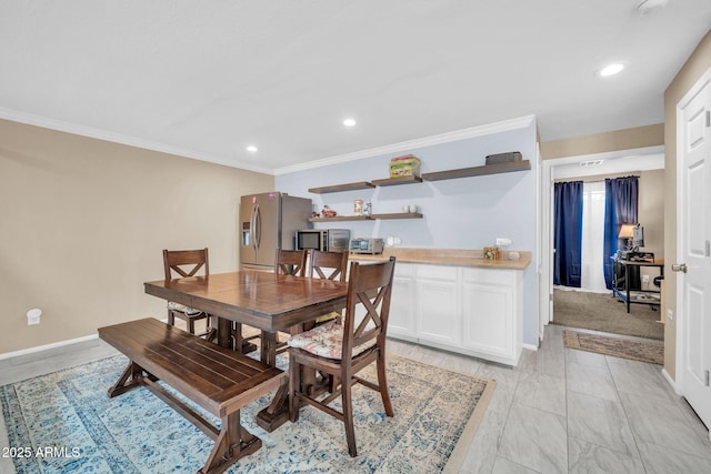 6708 W Utopia Rd, Glendale, AZ 85308 - dining space with recessed lighting, crown molding, and light marble finish floors