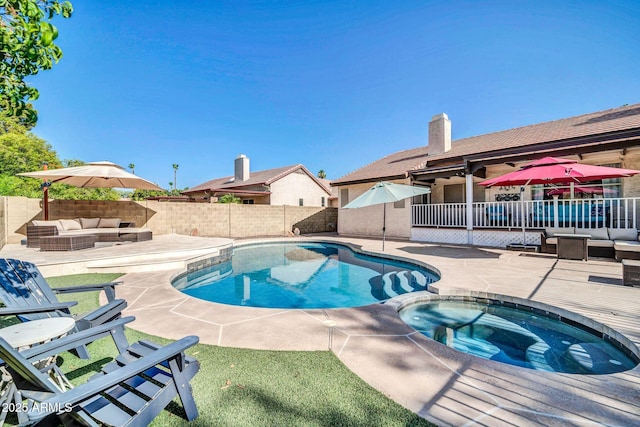 6708 W Utopia Rd, Glendale, AZ 85308 - view of pool with an outdoor hangout area, a patio, a fenced backyard, and a pool with connected hot tub