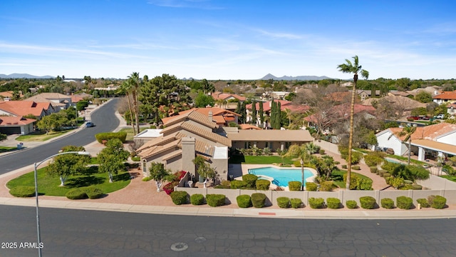 bird's eye view featuring a residential view and a mountain view