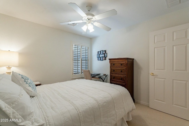 carpeted bedroom featuring ceiling fan