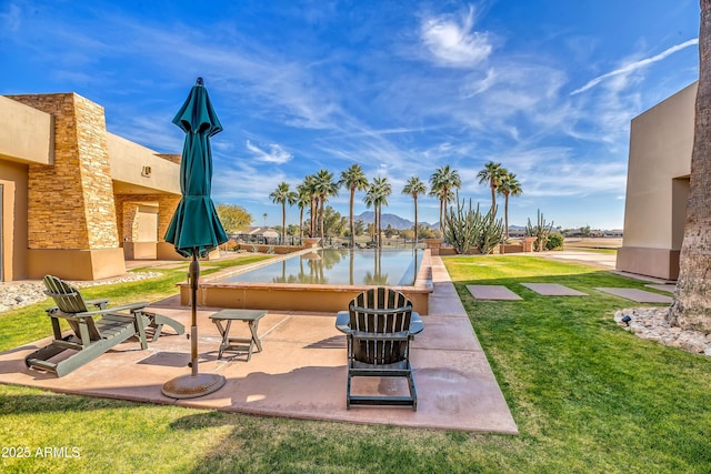 view of patio / terrace featuring a water view