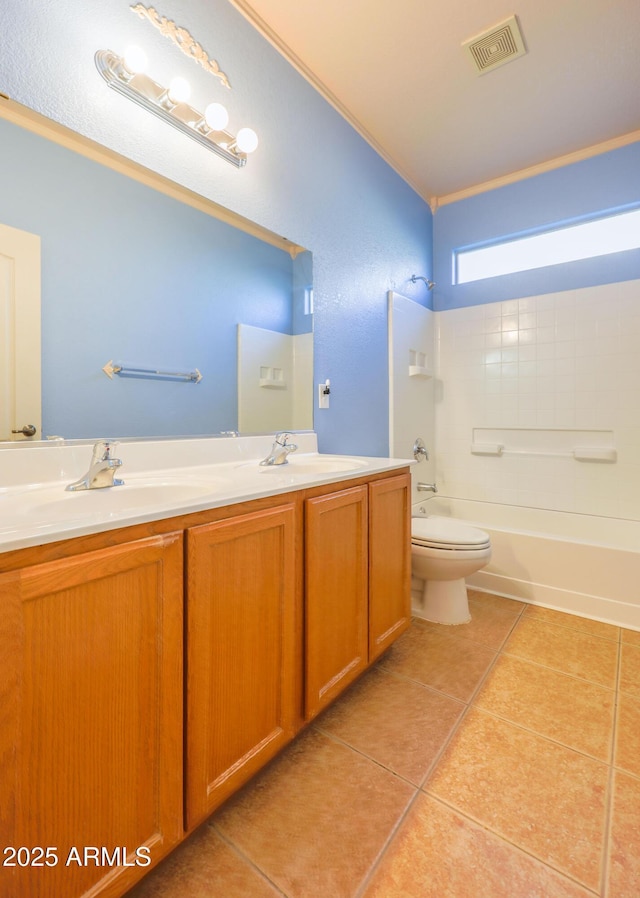 full bathroom with tub / shower combination, toilet, vanity, and tile patterned flooring