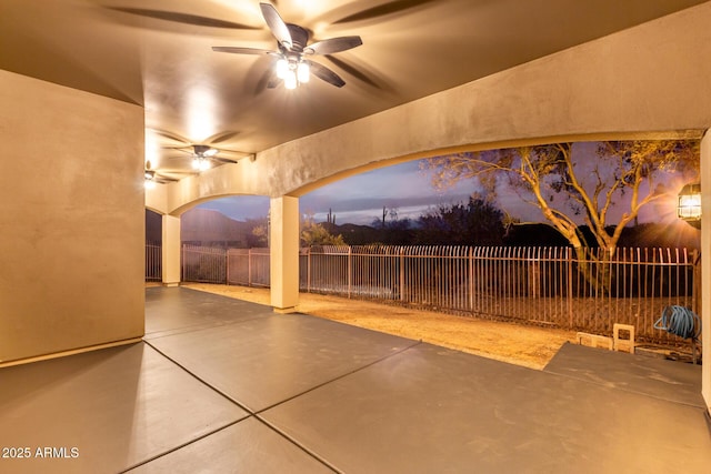 view of patio featuring a fenced backyard and ceiling fan