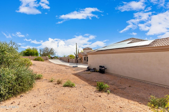 view of yard with a fenced backyard and a patio area