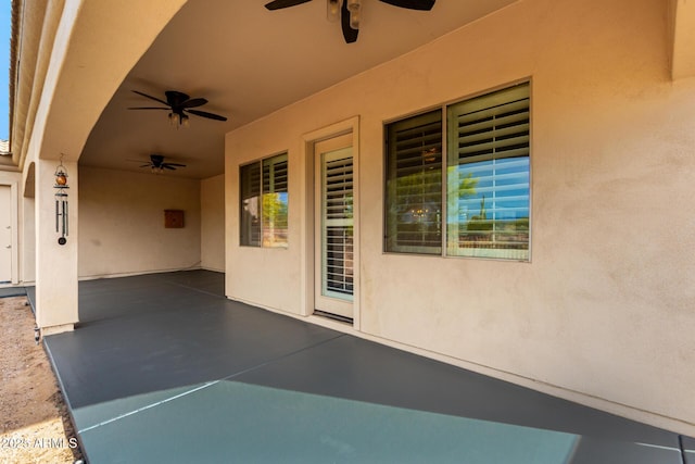 view of patio / terrace featuring ceiling fan