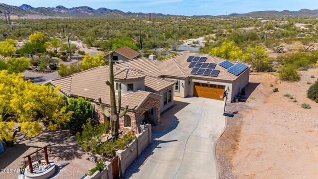 drone / aerial view featuring a mountain view