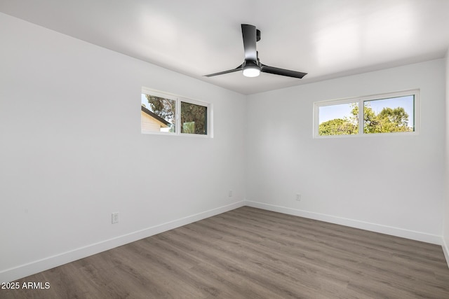 215 W Ruth Ave, Phoenix, AZ 85021 - empty room with plenty of natural light, wood finished floors, and ceiling fan