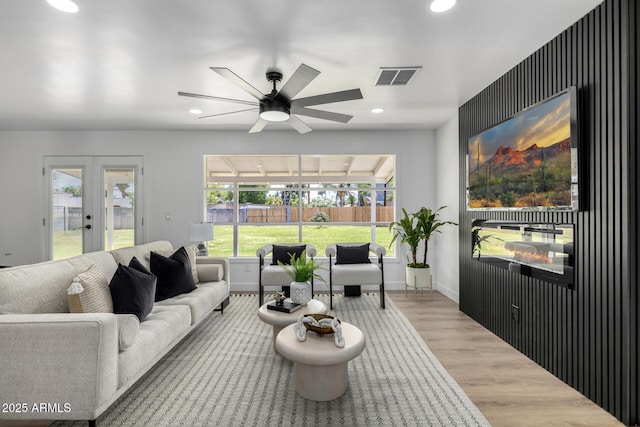 215 W Ruth Ave, Phoenix, AZ 85021 - living room with a ceiling fan, french doors, wood finished floors, plenty of natural light, and recessed lighting