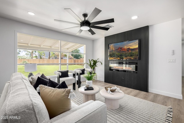 215 W Ruth Ave, Phoenix, AZ 85021 - living room featuring ceiling fan, wood finished floors, and recessed lighting