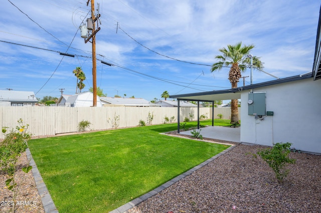 view of yard featuring a fenced backyard and a patio area