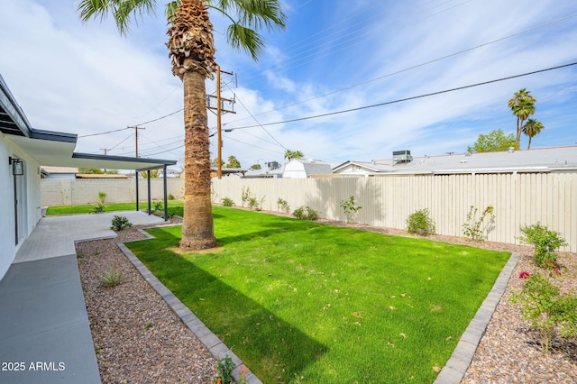 view of yard featuring a fenced backyard and a patio area