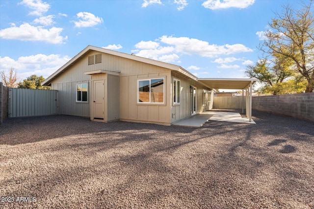 back of property featuring a patio area