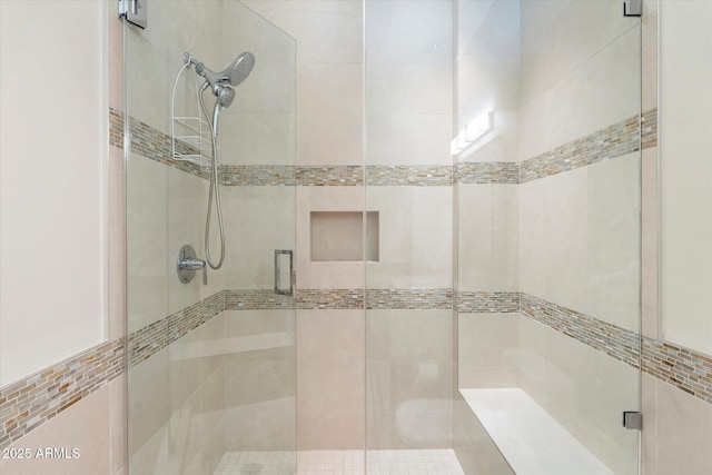 full bath with a shower stall