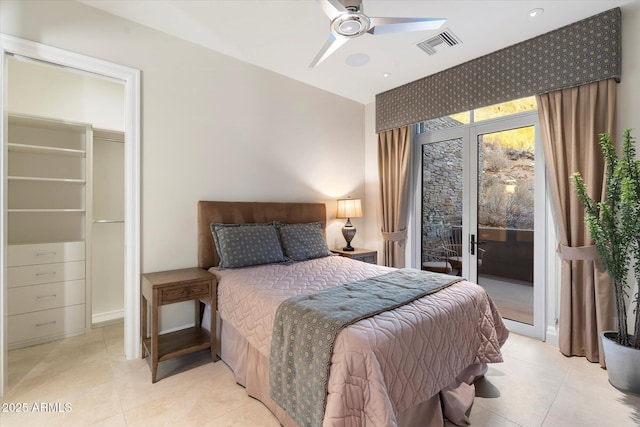 bedroom with light tile patterned floors, access to outside, ceiling fan, and visible vents