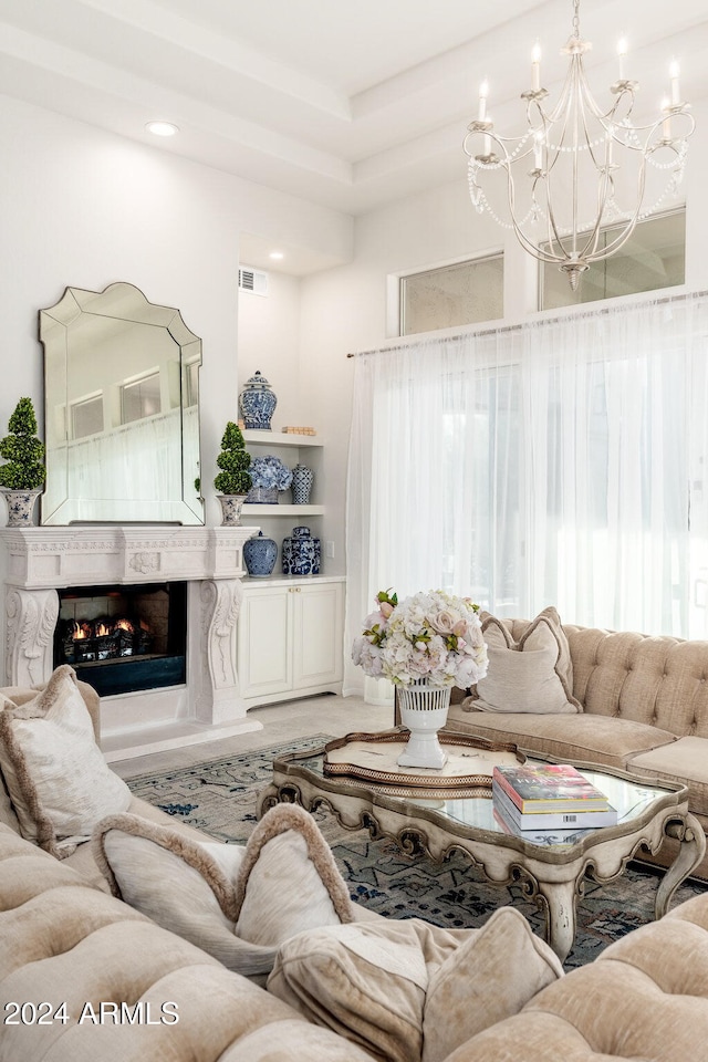 living room with an inviting chandelier